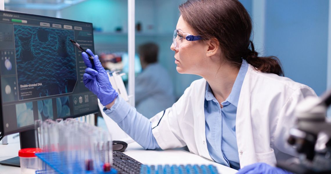A Medical biochemist is developing a new technology for discovering a vaccine. The doctor and her team analyse virus industry, working with professional technology for medicine industry.