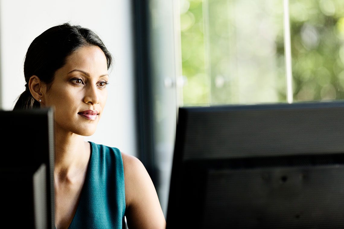 A woman working at a computer